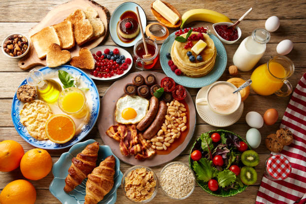 Breakfast buffet full continental and english Breakfast buffet full continental and english coffee orange juice salad croissant fruit continental breakfast photos stock pictures, royalty-free photos & images