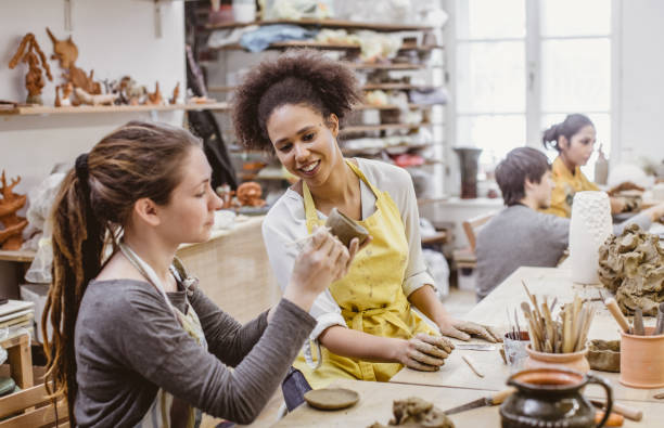 istock Small Group of People Doing Pottery in an Art Studio 917638732
