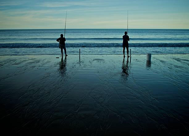 istock Fishing Couple on Ellis Beach 91765237