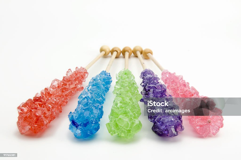 rock candy w pięciu kolorach - Zbiór zdjęć royalty-free (Cukrowa laska)