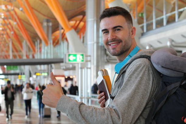 istock Smiley traveler giving a thumbs up 917656296