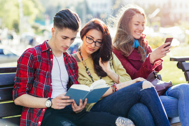 istock Friends spending time together outdoors in the park 917656378