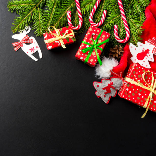 istock Christmas background with tree, presents and decorations 917659878
