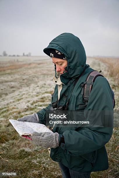 Map Reading Stock Photo - Download Image Now - Adult, Binoculars, Coat - Garment