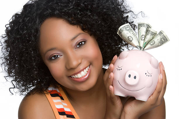 Woman Holding Piggybank stock photo