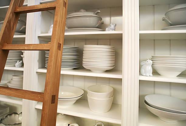 home cupboard with dishes stock photo