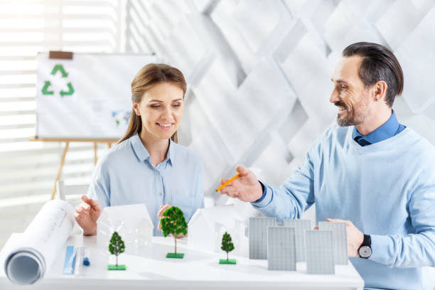 istock Happy colleagues working together on the project 917664444