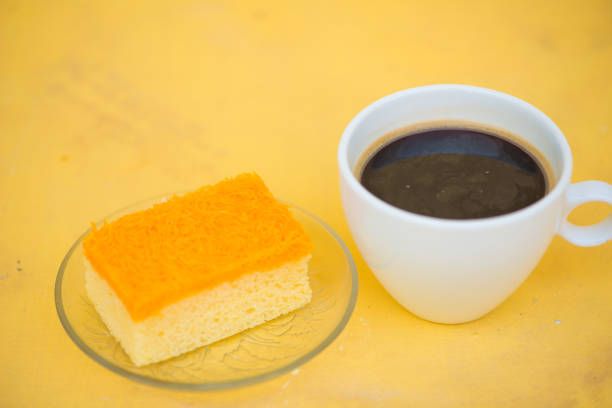istock A cup of coffee and golden threads cake 917665032