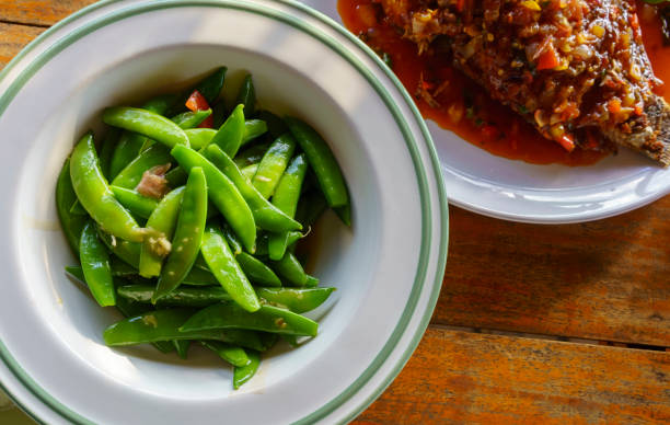 istock Thai food : Delicious fried green peas with oyster sauce 917665036