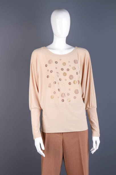 istock Mannequin dressed in female blouse. 917665586