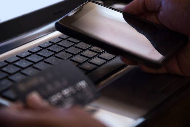 istock Selective focus on laptop online mobile phone payment internet banking concept 917669706