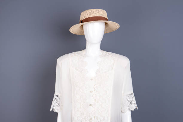 istock Woven hat and silk blouse on mannequin. 917677762