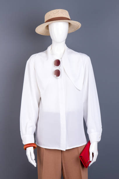 istock Straw hat, white blouse and fashion accessories. 917678660