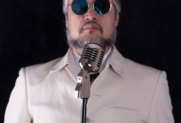 man in the studio by the microphone