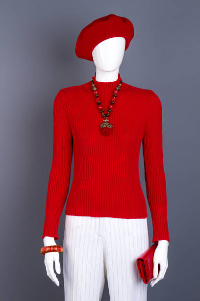 istock Mannequin with red clothes and accessories. 917692480