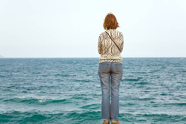 istock Woman see on spring sea 91769399