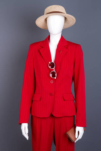 istock Female mannequin in elegant red attire. 917695580