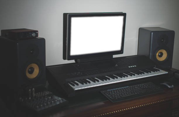 istock Home recording studio with professional monitors and midi keyboard. Place for text. 917696104