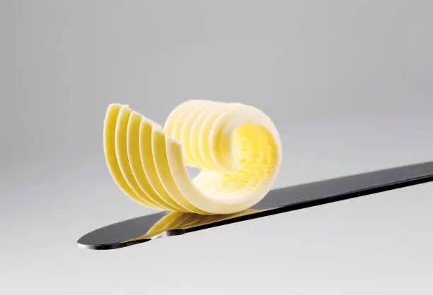 Butter curl on a knife 