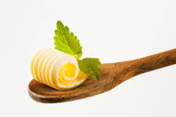 istock Butter curl on a wooden spoon 91769869