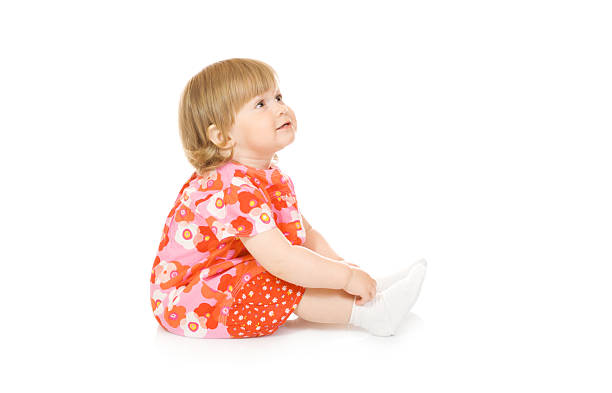 istock Small smiling baby in red dress isolated 91770085