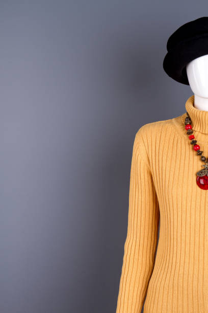 istock Female mannequin in hat and sweater. 917702348