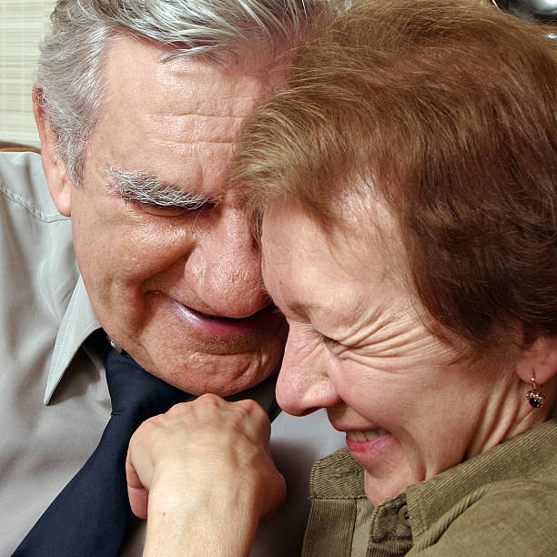 istock Happy elderly man and woman cuddling 91771176
