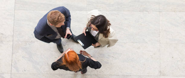 istock Business team discussing about work shot from above 917717156