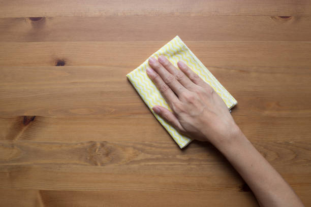 istock Cleaning table by woman hand 917727166
