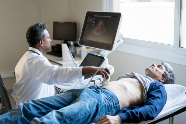istock Middle eastern doctor doing a ultrasonography on a male patient 917730090