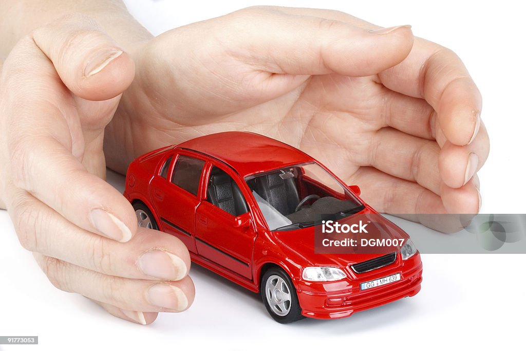 Red car in hands  Car Stock Photo