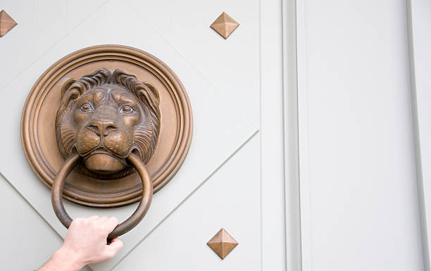 Lion doorknock – Foto