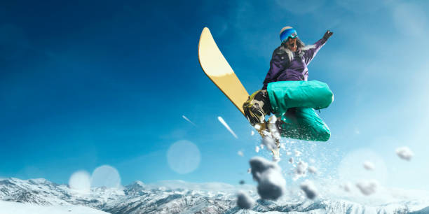 istock Female extreme freestyle snowboarder jump 917737746