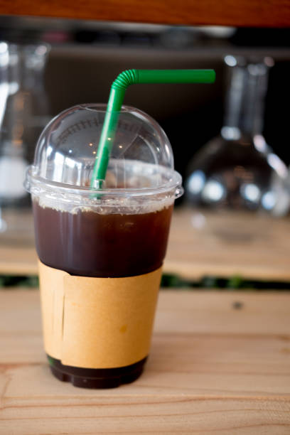 istock Plastic cup of iced black coffee (low fat good caffeine source for health) 917737936