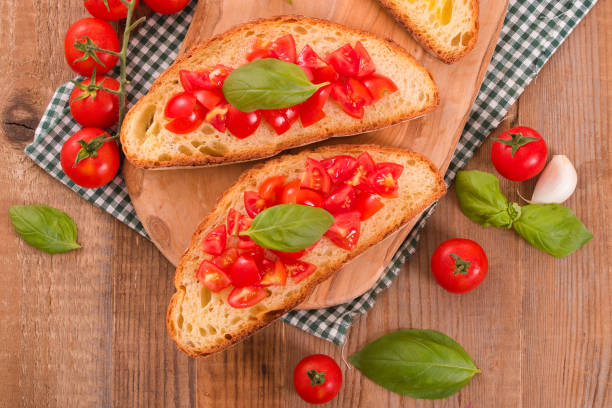 istock Bruschetta bread with basil and chopped tomatoes. 917738028