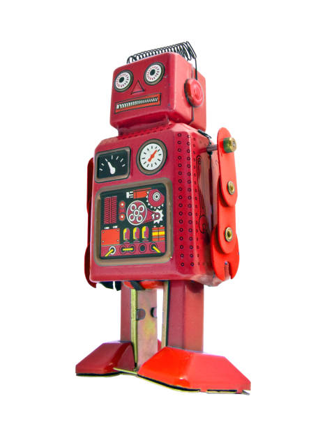 当惑の赤いロボット - robot conformity toy retro revival ストックフォトと画像