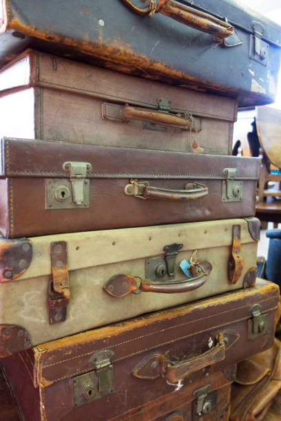 istock Vintage Used Suitcases Stacked Up 917738894