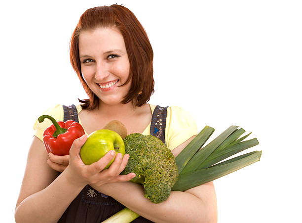 istock Woman eating vegetables 91774013