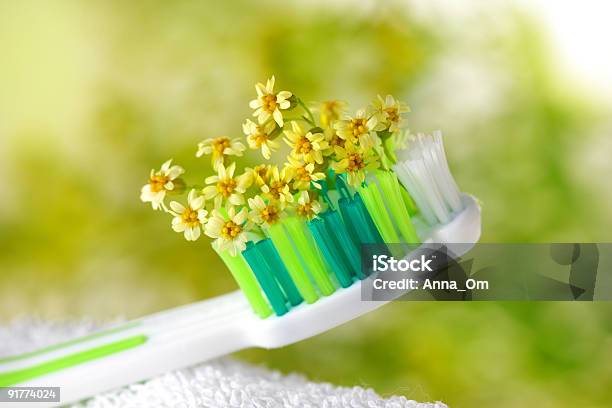 Toothbrush With Tiny Flowers Stock Photo - Download Image Now - Body Care, Care, Clean