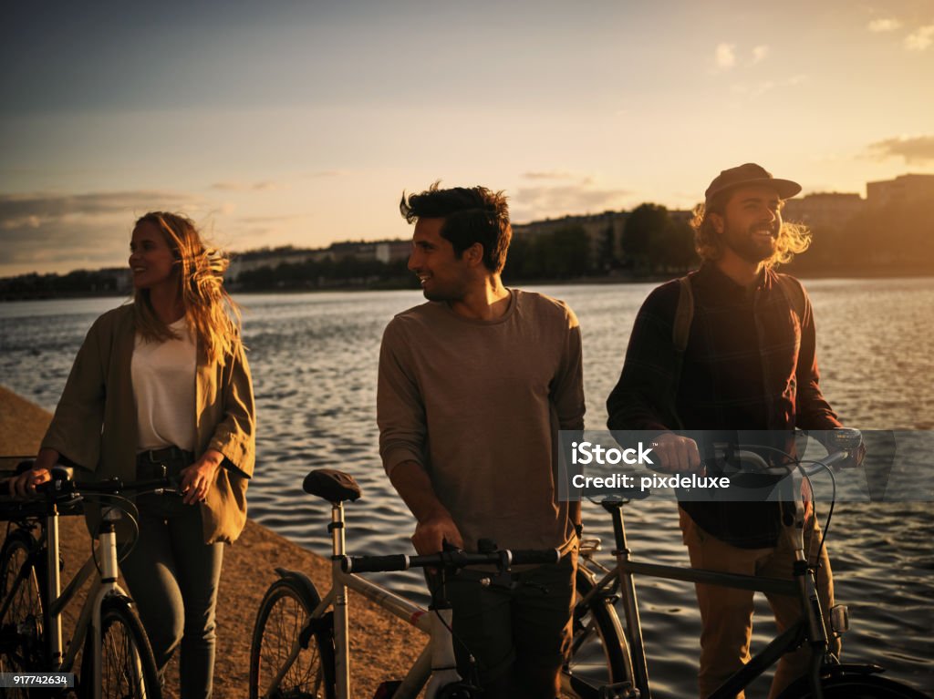 Sweet friendships refreshes the soul Shot of friends spending time together outside Friendship Stock Photo