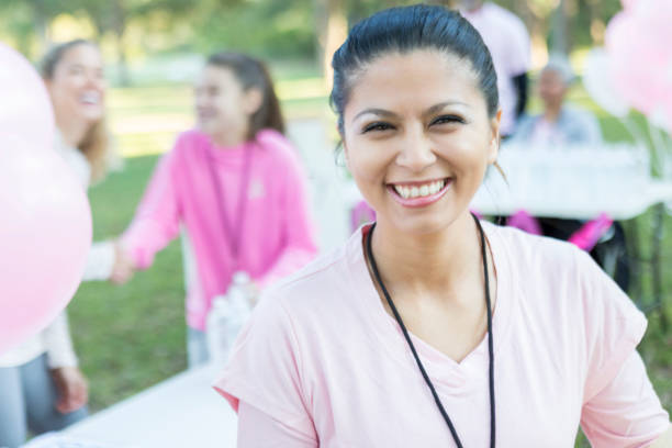istock Volunteer coordinator smiles for camera before charity race 917743694