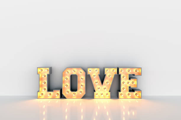 istock Love word with light bulbs inside on white clean wall background 917744170