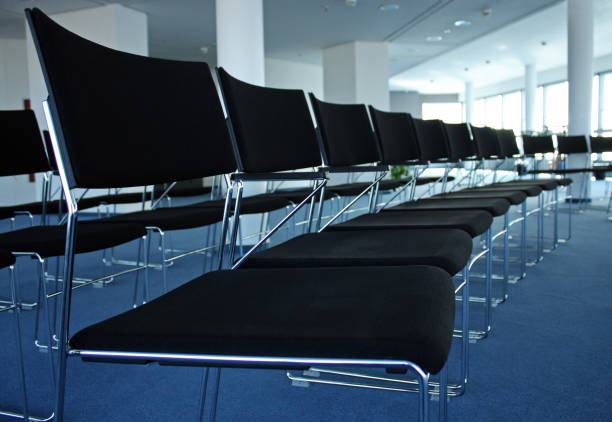istock Row of chairs in a conference room before the event 917744258