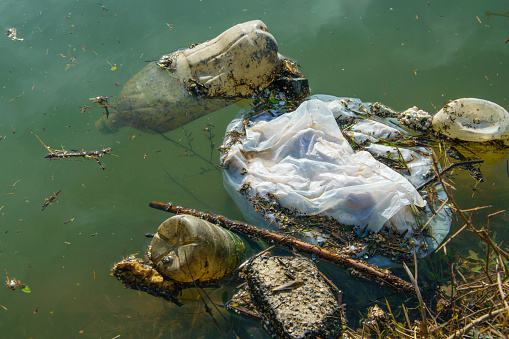Plastic pollution in water. Ecological industry concept
