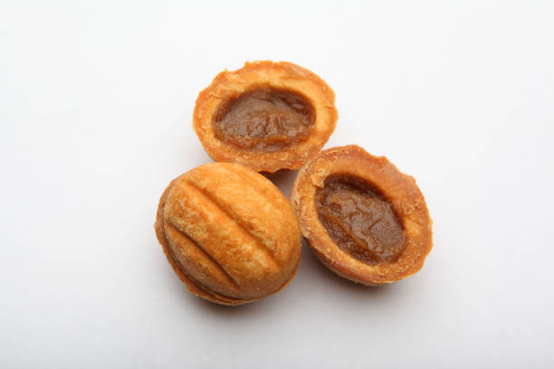 istock Cookies condensed milk white Background Studio 917755640
