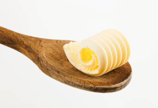 istock Butter curl on a wooden spoon 91775847