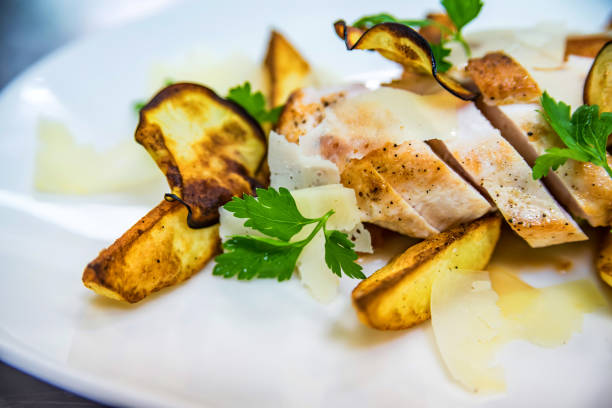 istock Grilled chicken with potato wedges plate 917759902