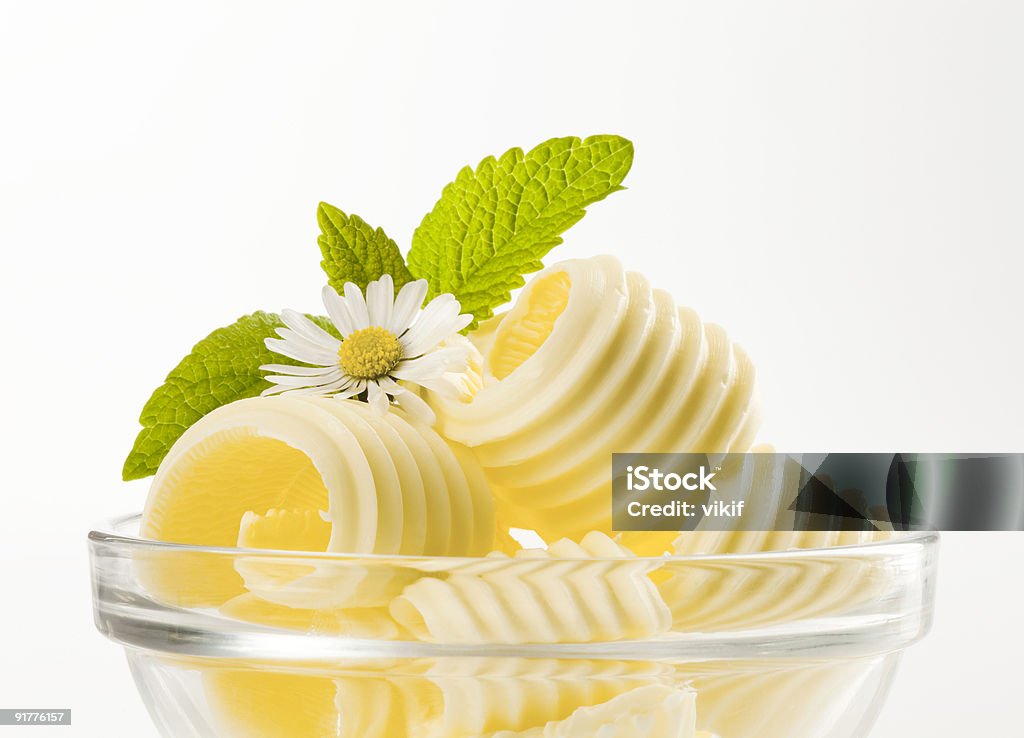 Butter curls in a glass dish  Butter Stock Photo