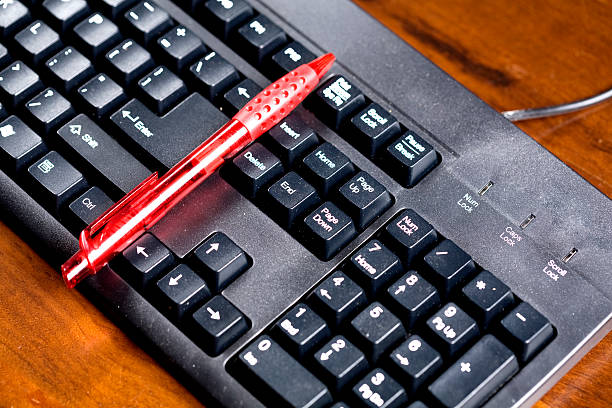 istock Black keyboard on dark oak office desk. 91776233