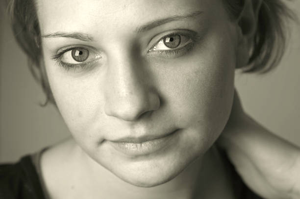 istock beautiful young woman with thoughtful expression 91776257
